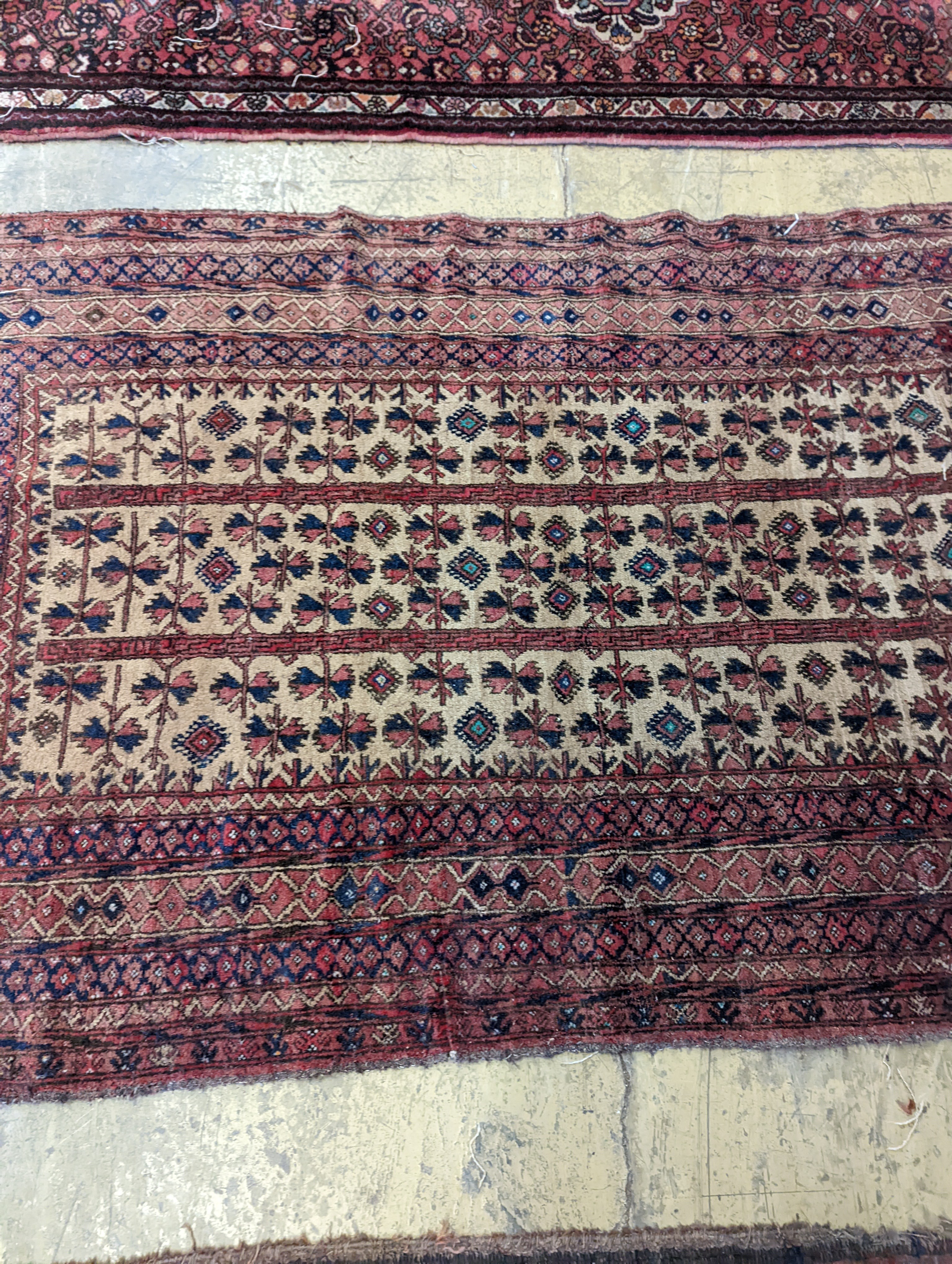 An antique Caucasian runner and a Belouch rug, larger 284 x 134cm